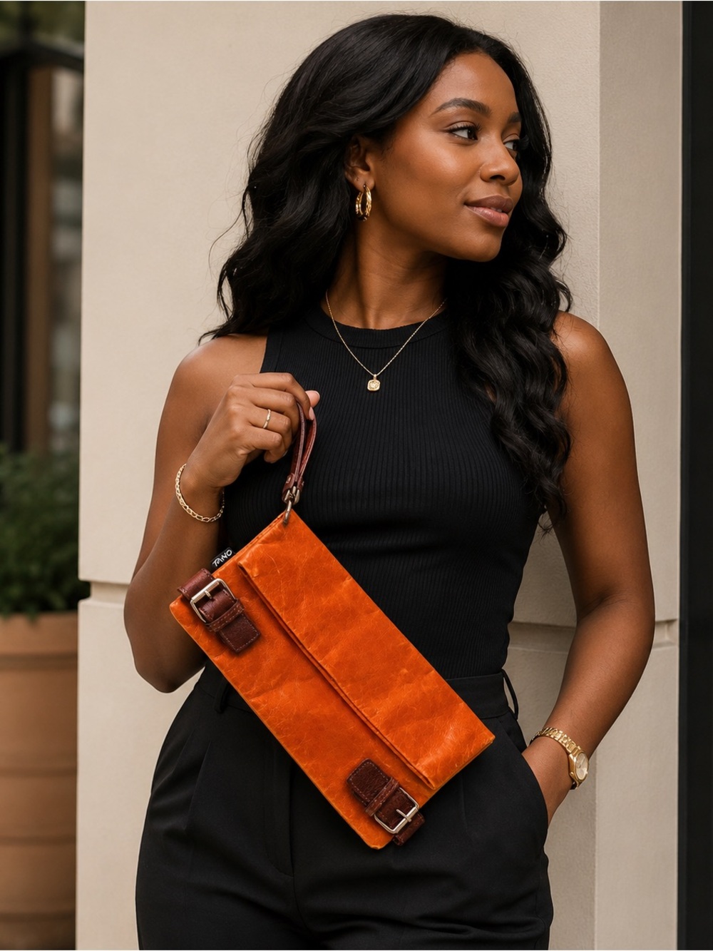 Tano Orange Leather Fold-Over Wristlet Clutch with Brown Accents